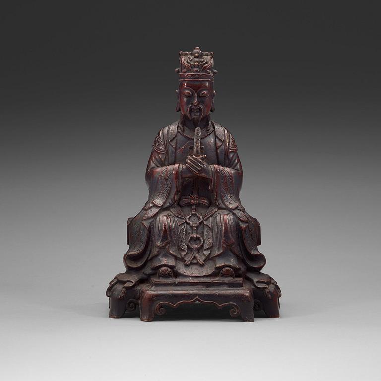 A bronze figure of a daoist deity, Qing dynasty, 18th Century.