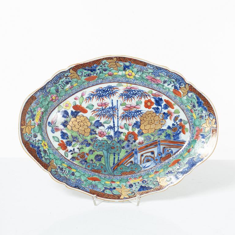 Two Chinese blue and white porcelain dishes and a small dish, Qing dynasty, 18th century.