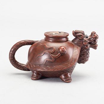 An unusual yixing tea pot, China, 20th Century. Seal to base.