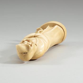 A Japanese ivory figure of a deamon, Meiji period (1868-1912).