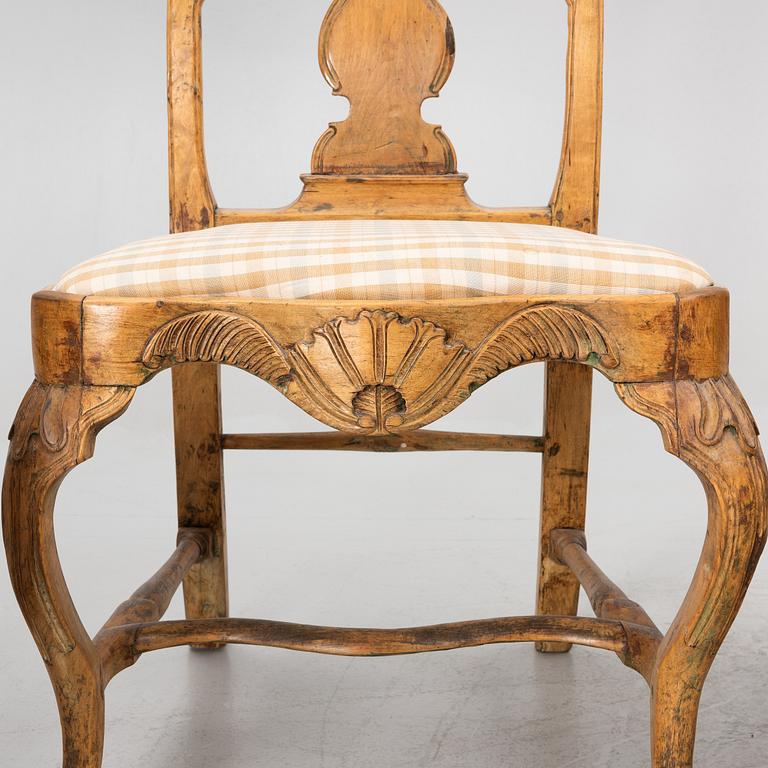 An assembled suite of ten rococo chairs, Western Sweden, later part 18th century.