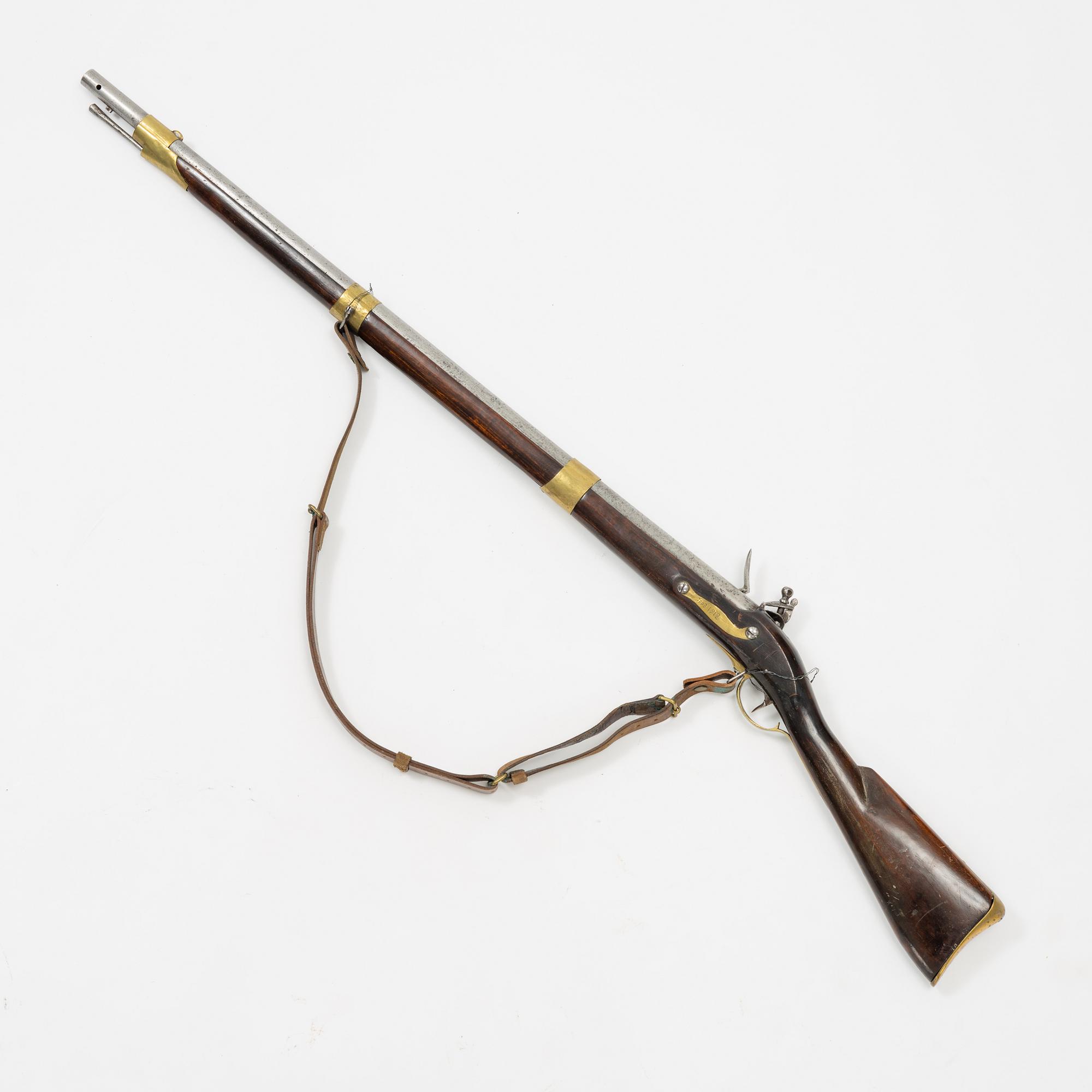A Swedish flintlock rifle with Brtitish lock.