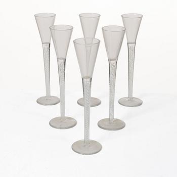 A set of six glasses with spiral stems, around 1900.