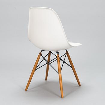 A 'Plastic chair DSW' by Charles and Ray Eames for Vitra.