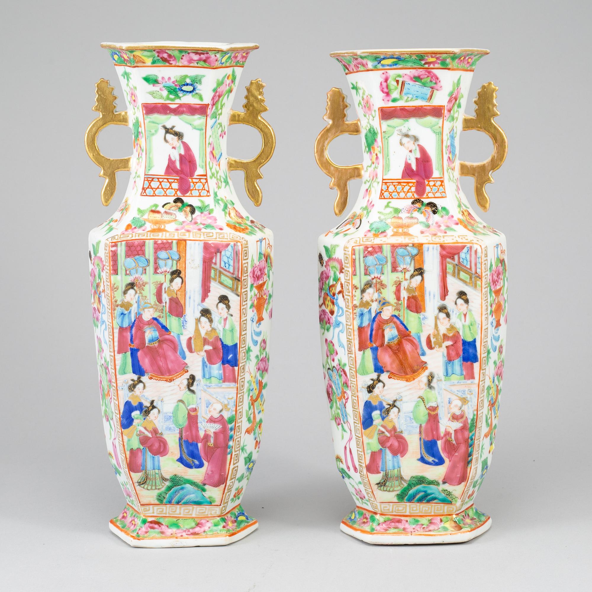 A pair of famille rose canton vases, Qing dynasty, 19th century.