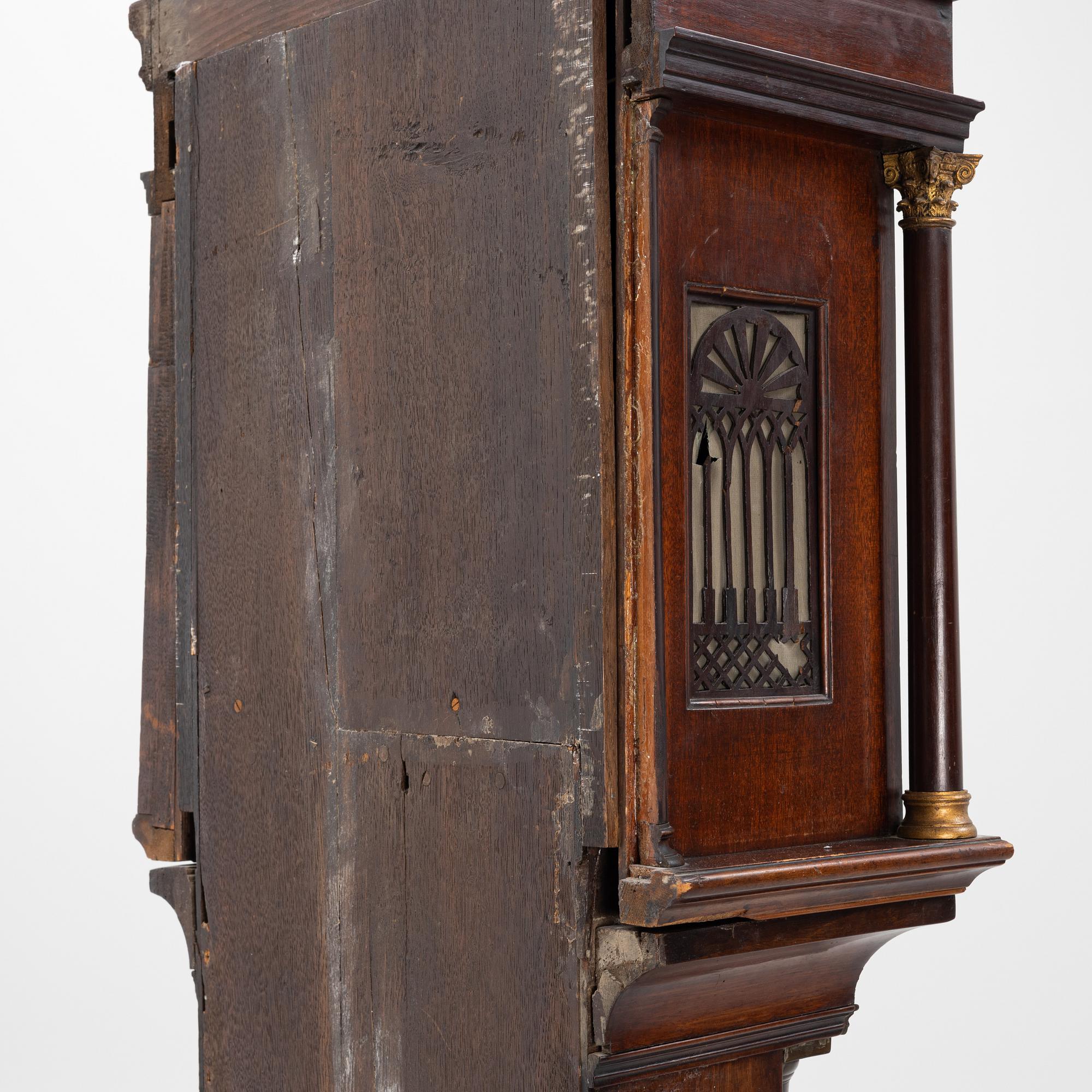 A mahogany veneered longcase clock, marked Peter Pohlmann, London, England, 18th century.
