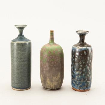 Rolf Palm, a set of three miniature stoneware vases.