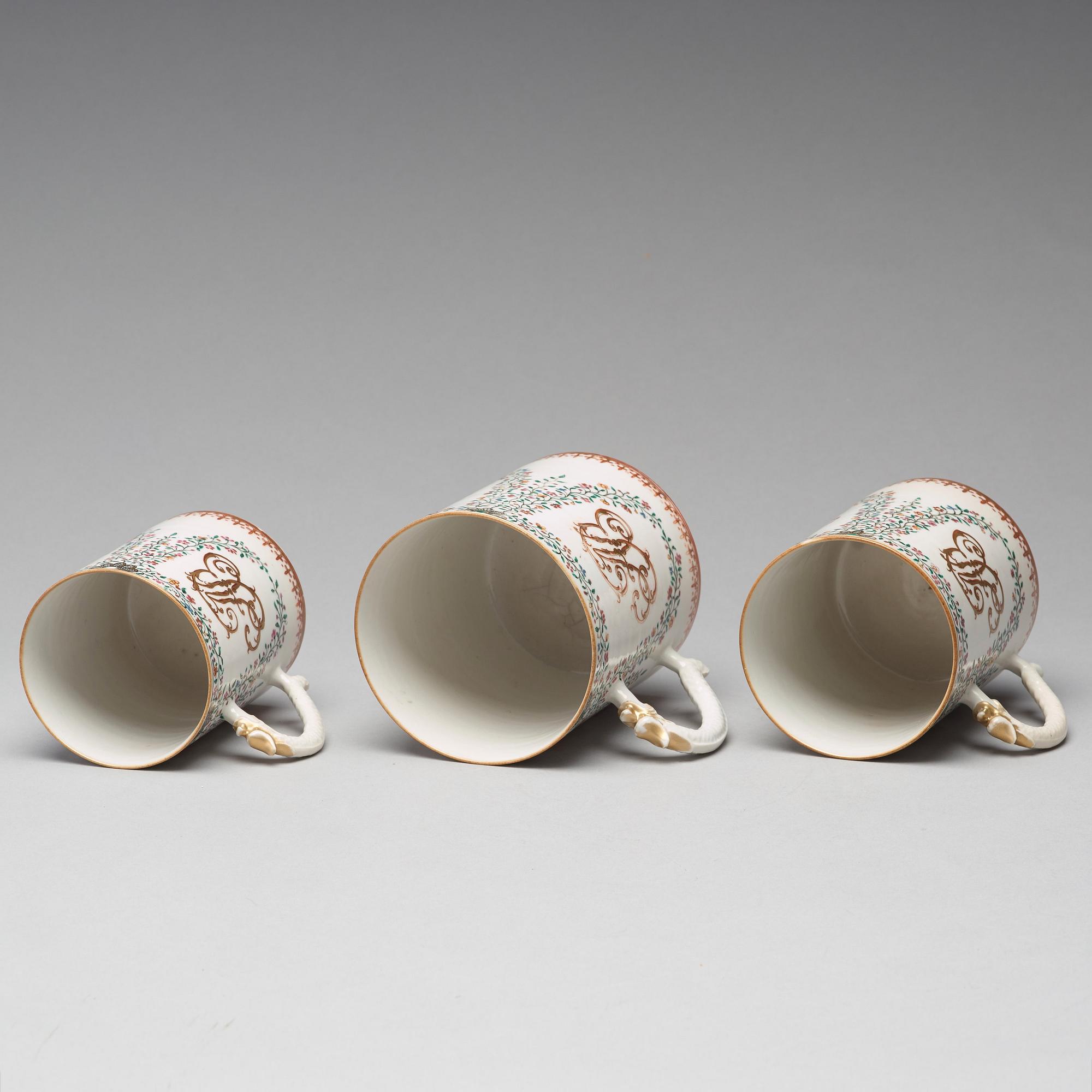 A group of three famille rose armorial jugs, Qing dynasty, Qianlong (1736-95).