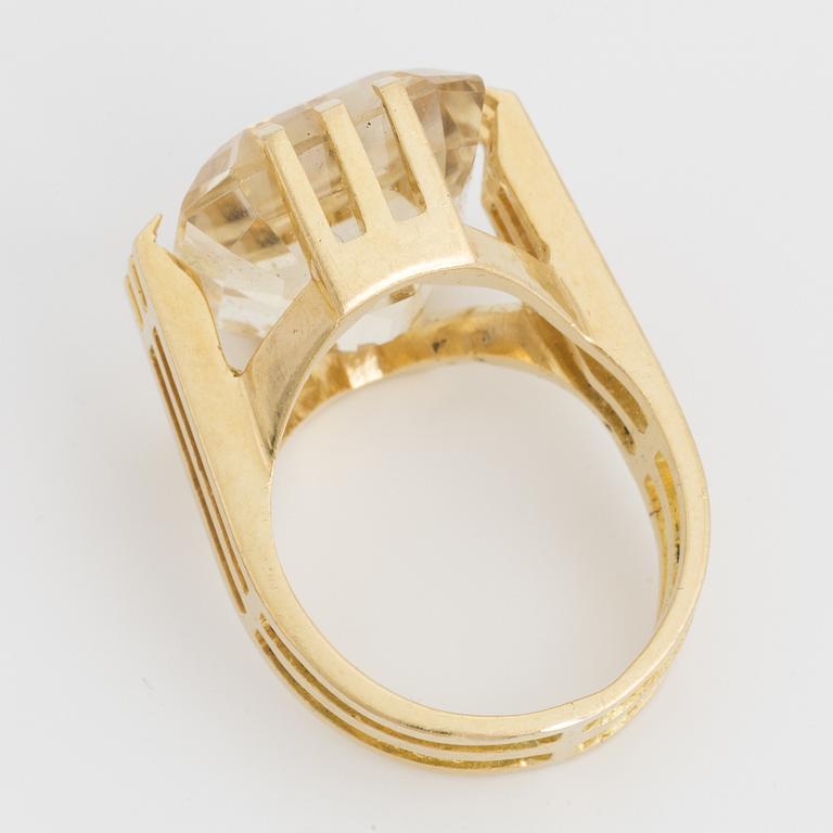 An emerald-cut citrine.