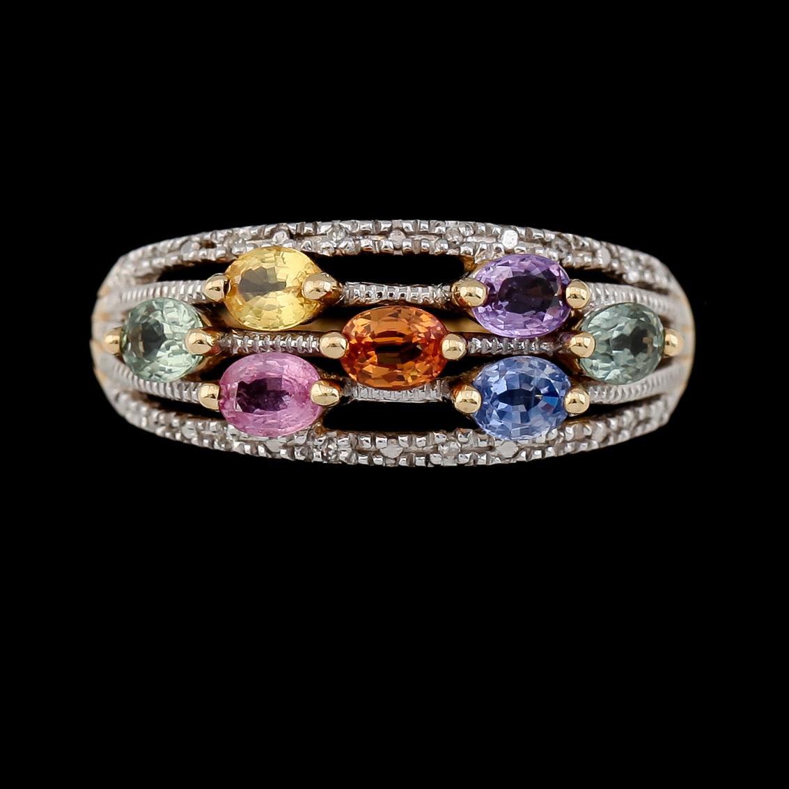 RING, 14K tvåfärgat guld, safirer och diamanter tot ca 0.04 ct. Vikt ca 4 g.