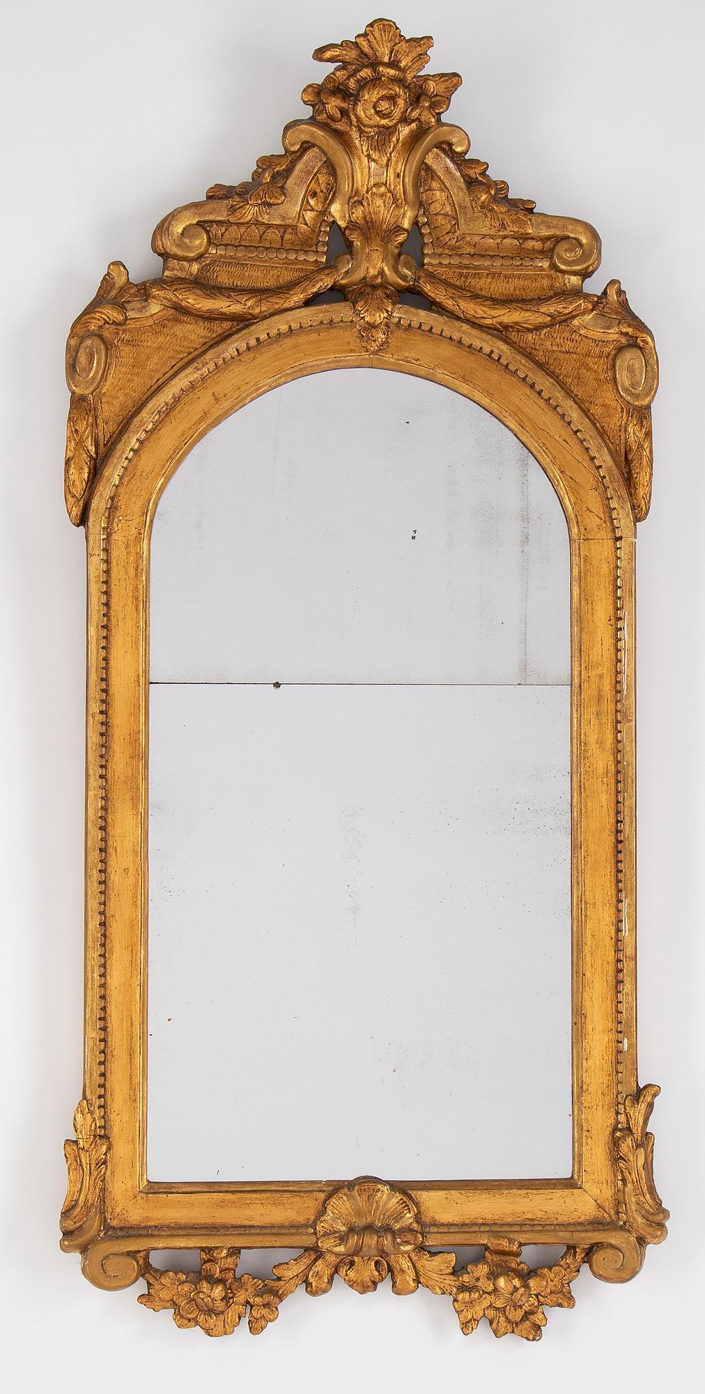A gilt mirror, Stockholm, second half of the 18th Century.