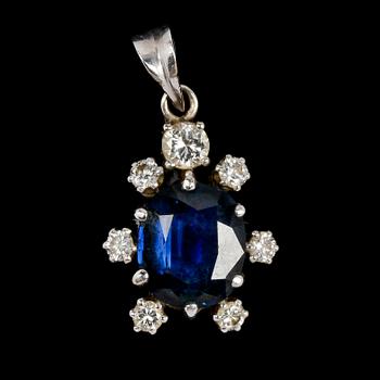 1110. PENDANT, blue sapphire and brilliant cut diamonds, tot. app. 0.40 cts.