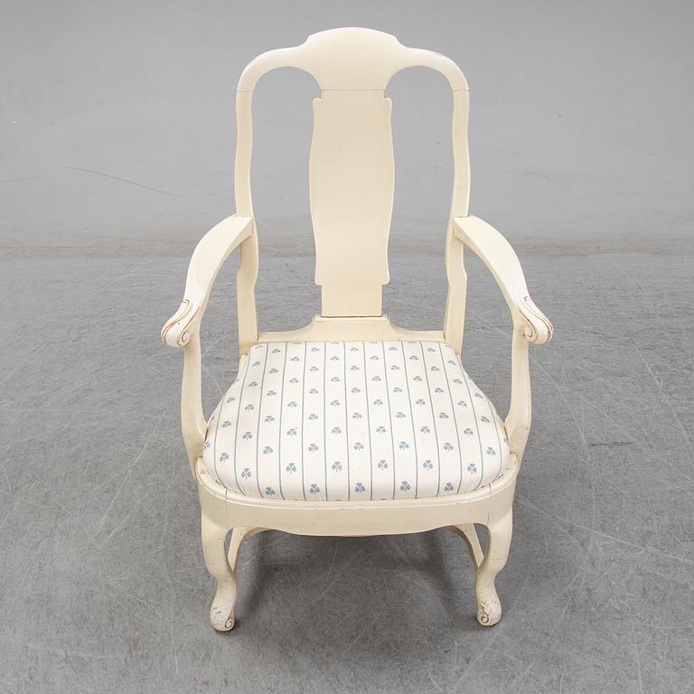 A set of six chairs and a pair of armchairs, rococo style, early 20th century.