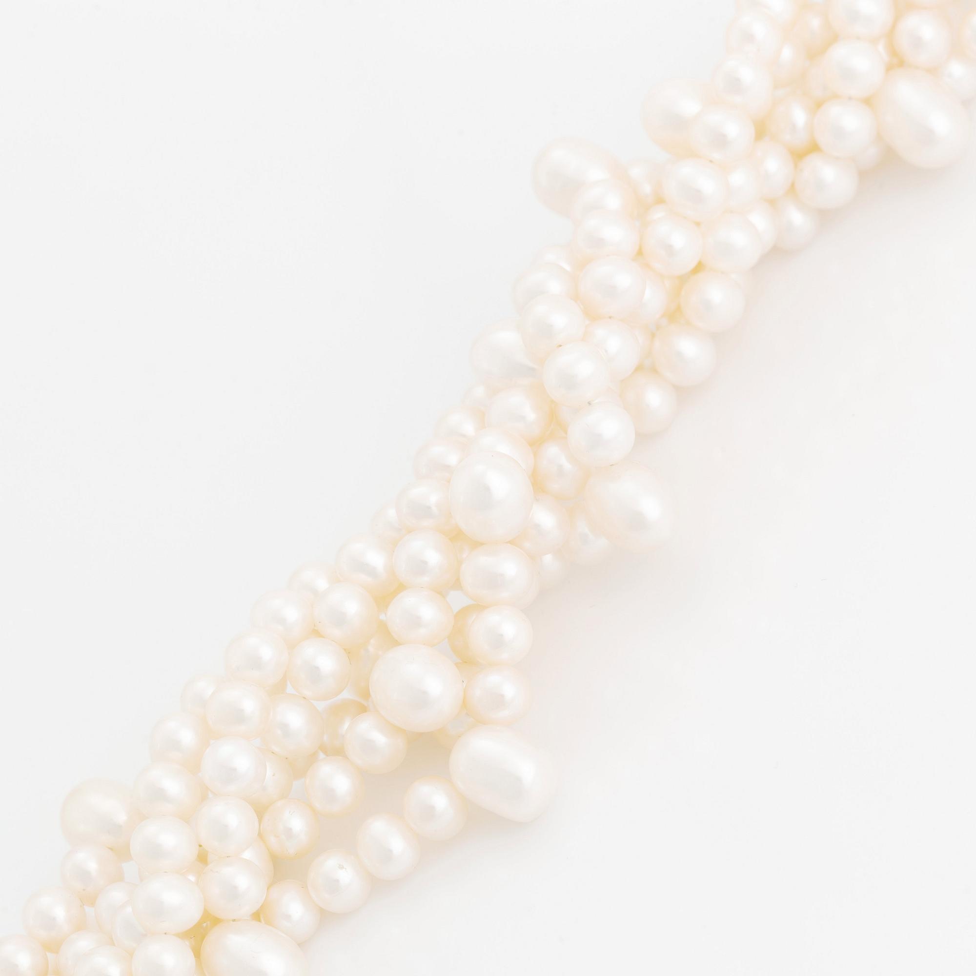 A cultured freshwater pearl necklace and bracelet.