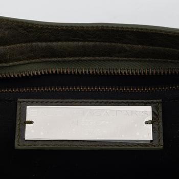 Balenciaga, a green leather bag.