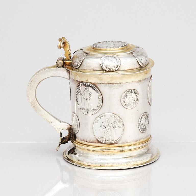 A German 18th century parcel-gilt silver tankard, mark of Andreas Junge I, Königsberg, possibly 1736.