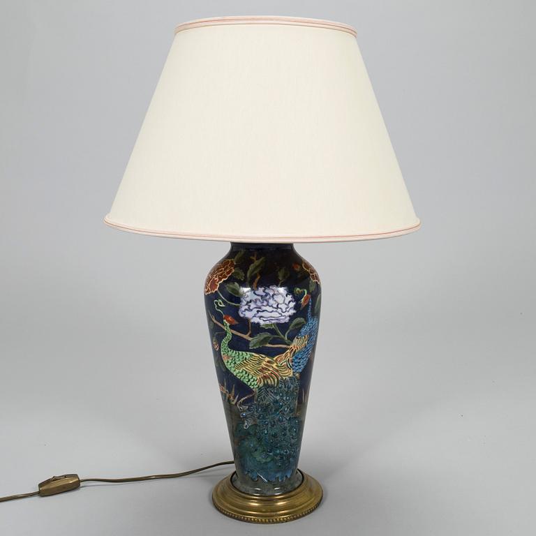 A painted porcelain table lamp, later part of the 20th century.