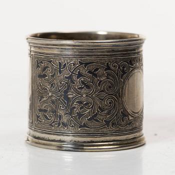 A Russian silver niello napkin ring and spoon, late 19th century-early 20th century.