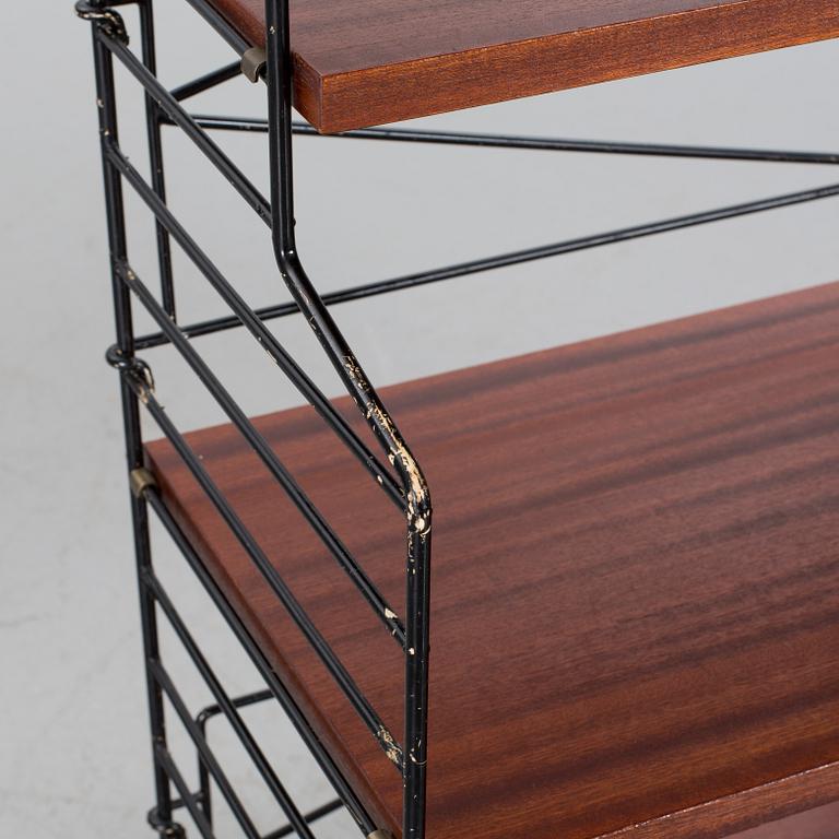 A BOOK CASE BY NISSE STRINNING FOR STRING DESIGN AB.