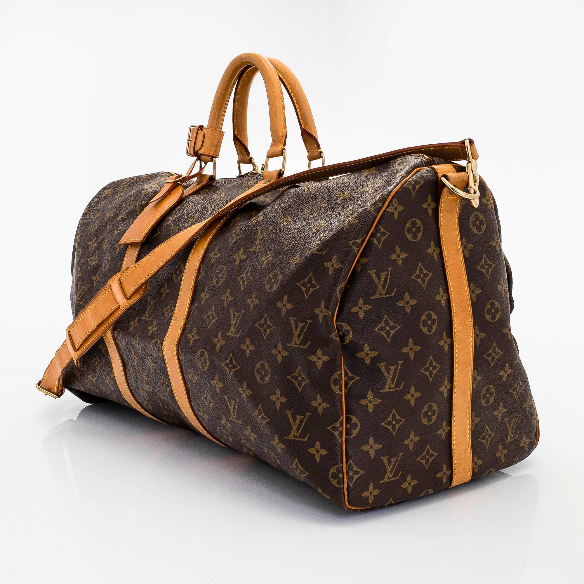 Louis Vuitton, a Monogram Canvas 'Keepall 55 Bandoulière' weekend bag.