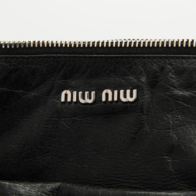 Miu Miu, A 'Bow Satchel' bag.