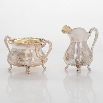 Sugar bowl, cream jug, pastry tong, and 6 coasters, silver, Auran Kultaseppä, Turku 1964-81.