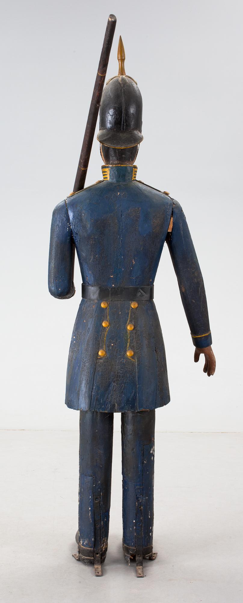 A Swedish 19th Century wooden sculpture.