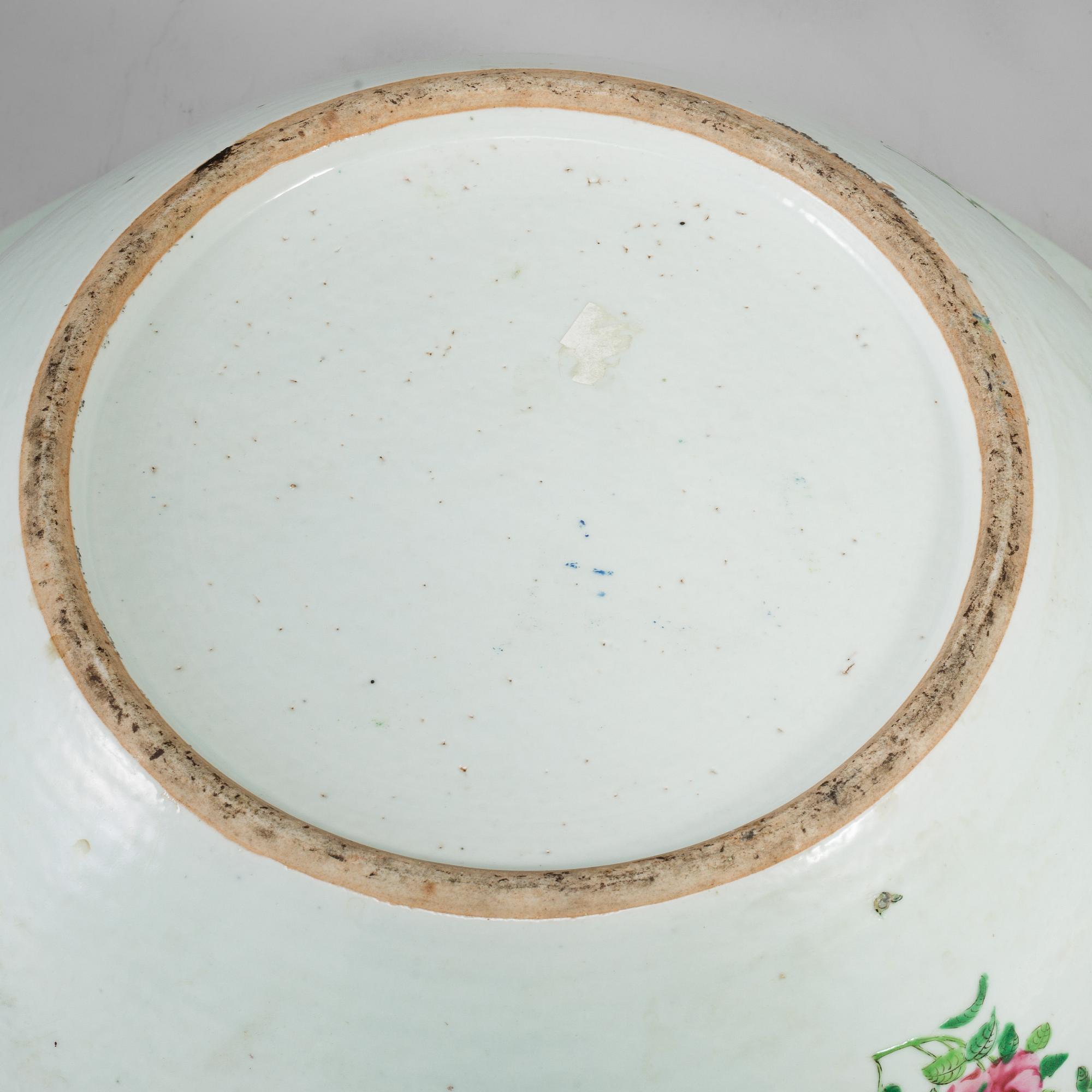 A very large famille rose Canton punch bowl, Qing dynasty, late 19th century.