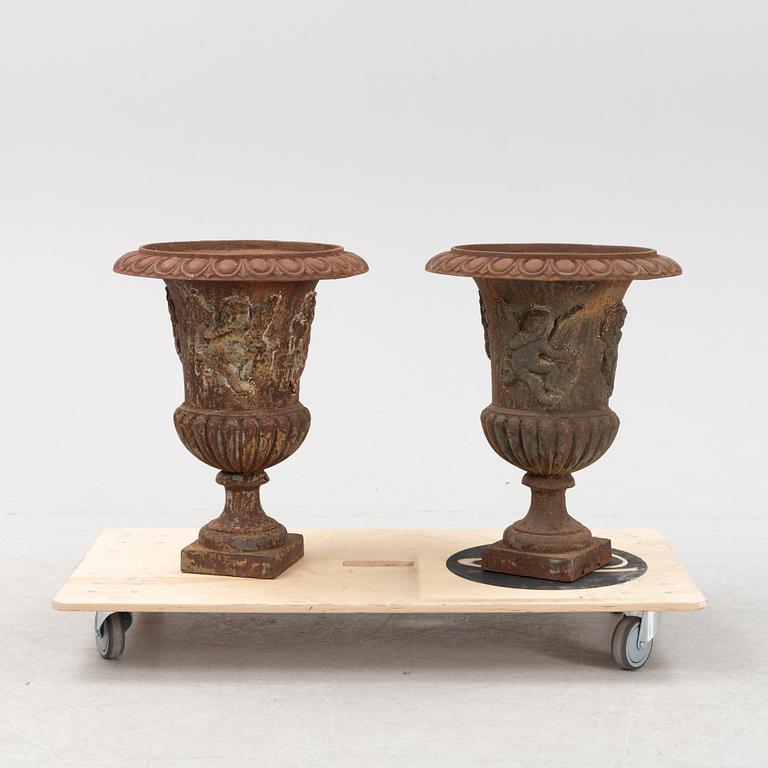 A pair of cast iron garden planters, late 20th Century.