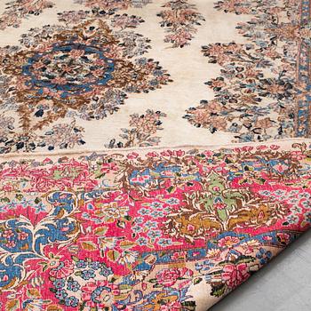 A Kerman carpet, around 360 x 262 cm.