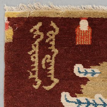 A pillar rug, a semi-antique/an old Chinese, ca 195 x 92,5-93 cm.