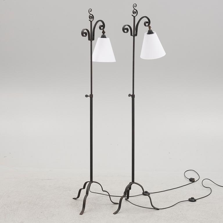 Harald Notini, a pair of wrought iron floor lamps, model '15101', Arvid Böhlmarks Lampfabrik, 1930's.