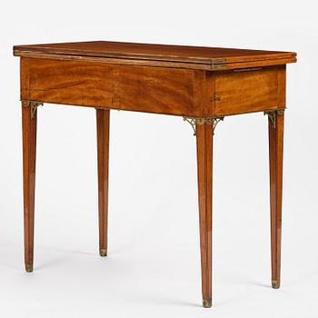 A late Gustavian mahogany games table, presumably by A. Nordström (Journeyman at G. Iwersson 1806-09).