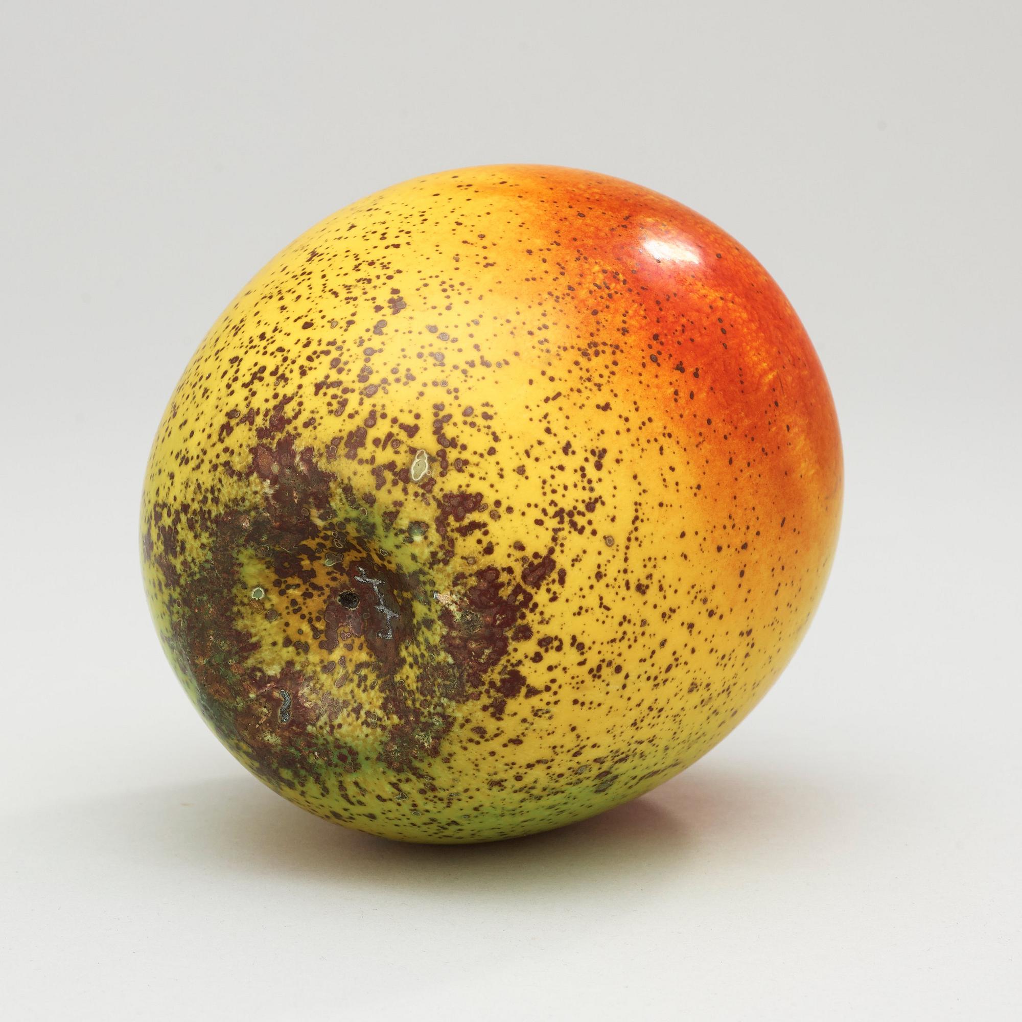 A Hans Hedberg faience apple, Biot, France.