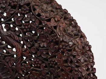 A pair of carved 'blackwood' armchairs, Bombay presidency, British Raj, circa 1880.