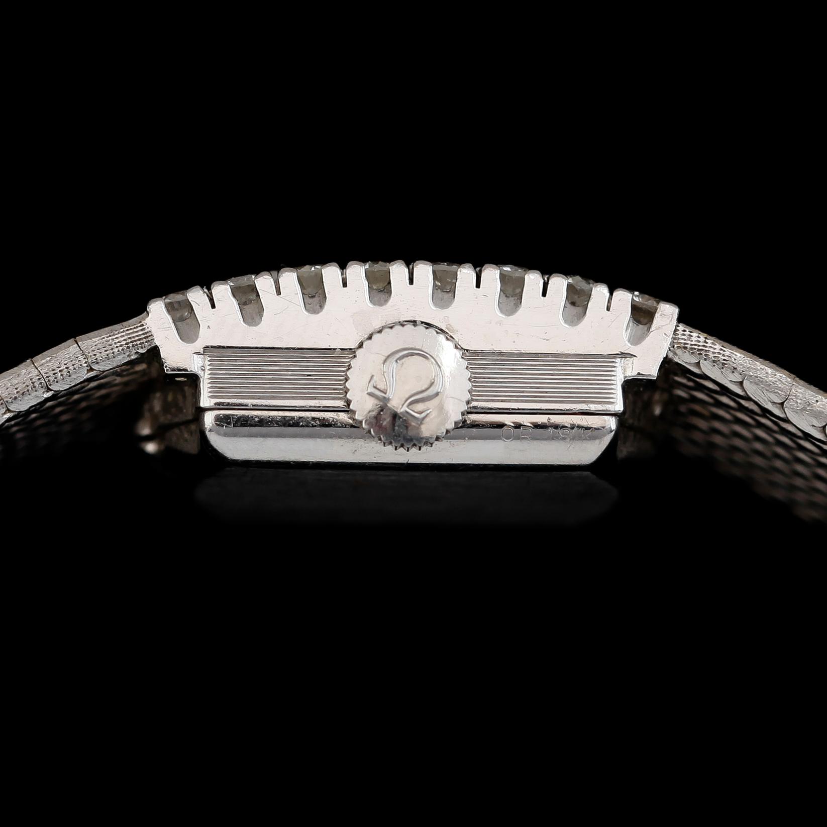 ARMBANDSUR, 18K vitguld med biljantslipade diamanter, Omega. Total vikt ca 55 g.
