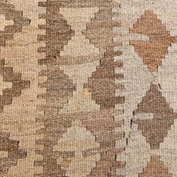 A Kilim carpet, ca. 305 x 196 cm.