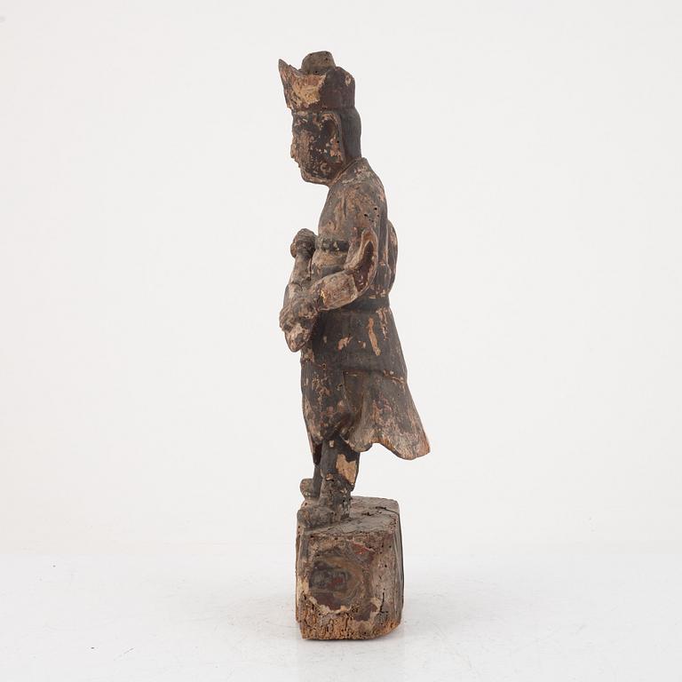 A Chinese wooden gardian figure, Qing dynasty.