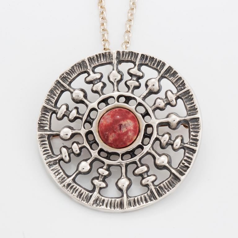 A David Andersen silver pendant.