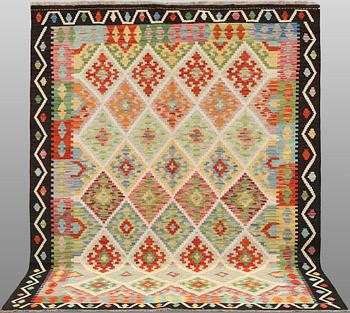 A kilim carpet, 241 x 182 cm.