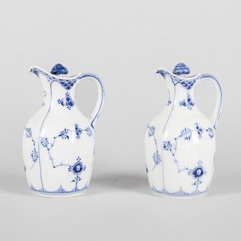 A pair of 'Blue Fluted' porcelain oil and vinegar pitchers and a tray, Royal Copenhagen, models 1179, 1180 and 1195.