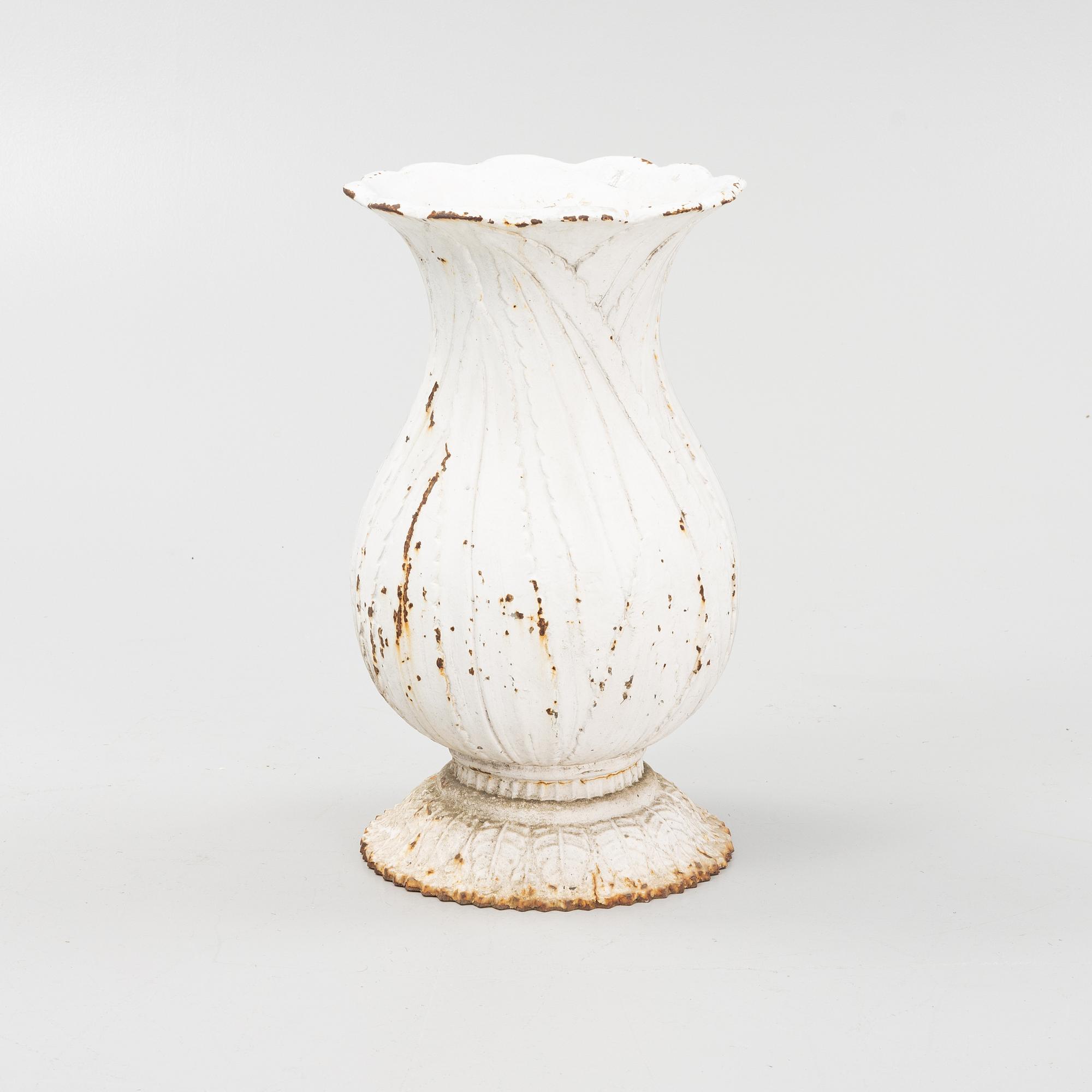 A 20th Century cast iron garden urn.