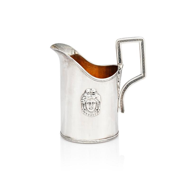 A Swedish 19th Century parcel-gilt silver cream-jug, mark of Adolf Zethelius, Stockholm 1816.