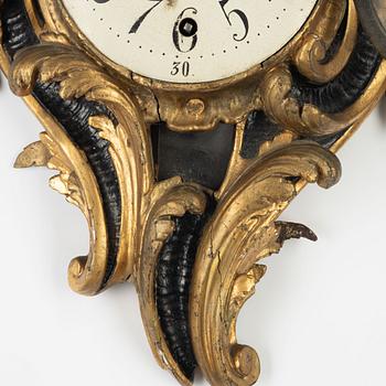 A Rococo wall clock, second half of the 18th Century.