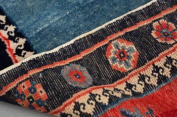 Matto, a saddle cover/a rug, semi-antique/old China, ca 129 x 63 cm.