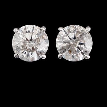 ÖRHÄNGEN, 1 par, 14 k vitguld, solitära briljantslipade diamanter tot ca 1.50 ct.