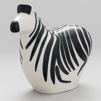 A STONEWARE FIGURINE by LILLEMOR MANNERHEIM, signed Lillemor Arabia -85.