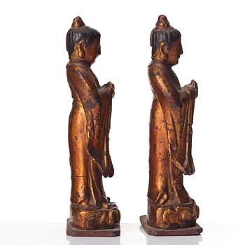 A pair of lacquered sculptures, Ming dynasty (1368-1644).