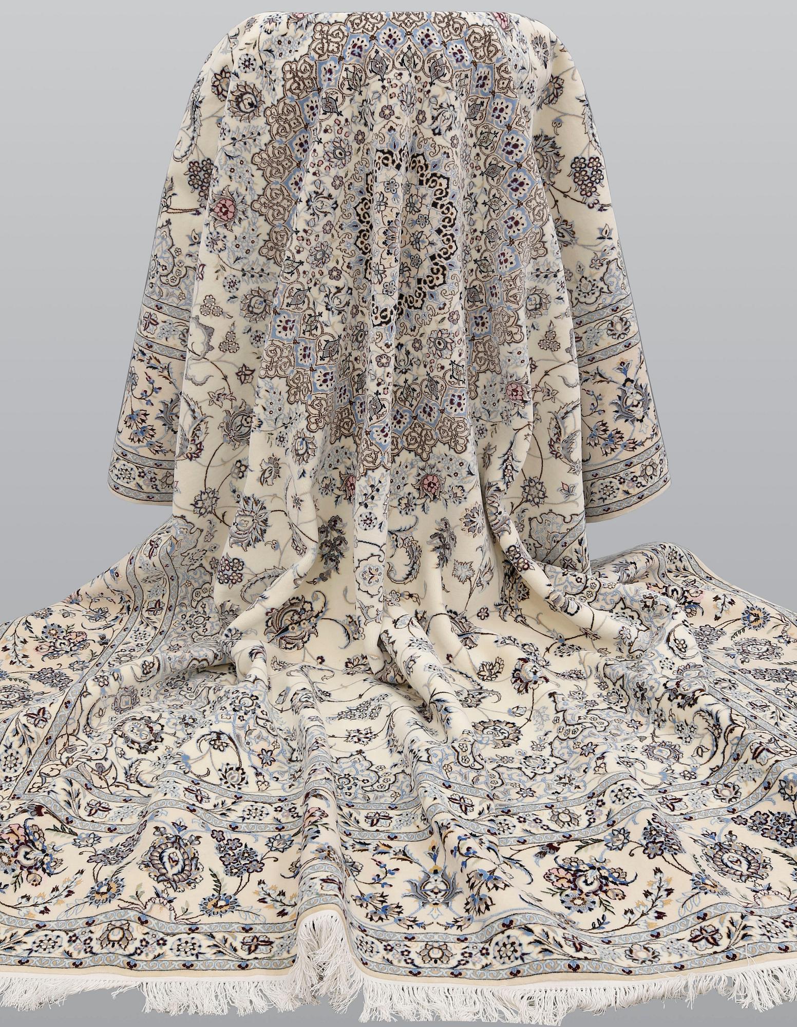A Nain part silk carpet, 408 x 308 cm.