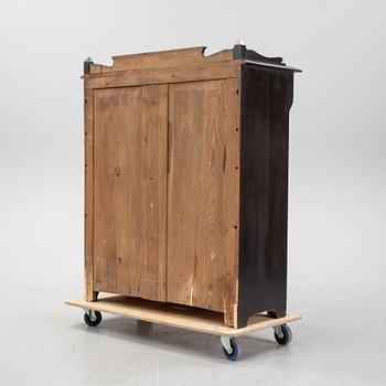 A painted cupboard, early 20th Century.